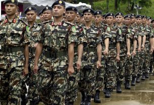 KUKULE, SRI LANKA:  Nepalese troops march past as they take part in a joint drill with security forces from Bangladesh, Mongolia, the US and Sri Lankaat the start of a United Nations Peace Keeping Exercise in the village of Kukule, some 60kms south-east of Colombo, 12 June 2004.  The Multinational Platoon Exercise is aimed at grooming soldiers for United Nations peacekeeping operations with 45 soldiers each from Bangladesh, Mongolia, Nepal and the United States and 70 from Sri Lanka taking part in the two-week exercise.   AFP PHOTO/Sena VIDANAGAMA  (Photo credit should read SENA VIDANAGAMA/AFP via Getty Images)